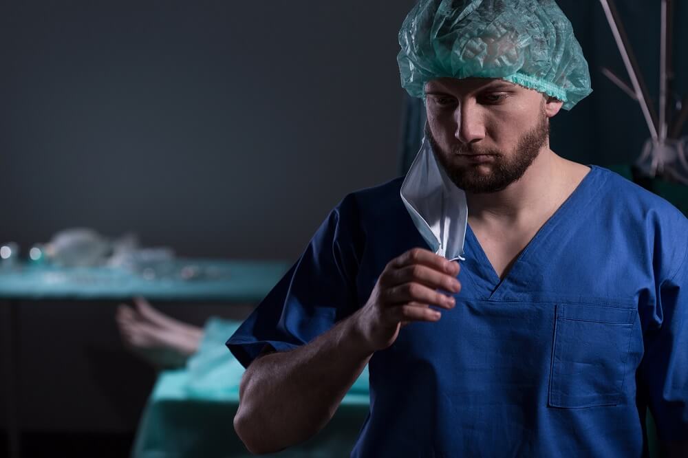 Surgeon upset over failed operation.